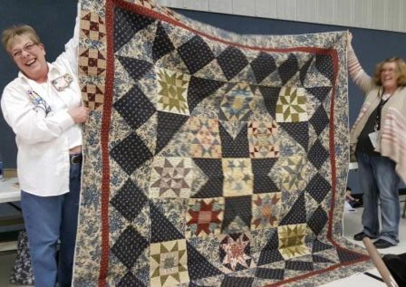 Lori is showing a General's Wives quilt, taught at PVVS. Heather is now the owner